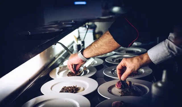 Food being plated, from Alchemy’s website