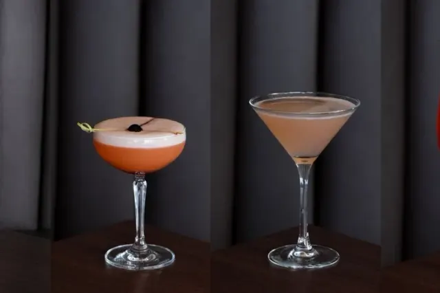 Two cocktails served on a table at Bayside Lounge.