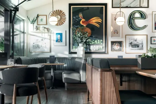 Booths and artwork inside Earls Fir Street.