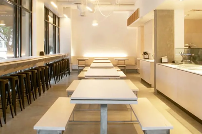 Tables, benches and window seating at Ignite Pizzeria Mount Pleasant.