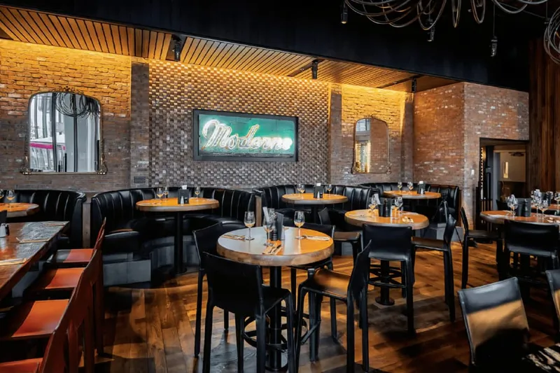 Round tables and booths inside JOEY Bentall One.